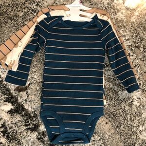 Carters Long Sleeve Onesie’s. Size 9 months. New.